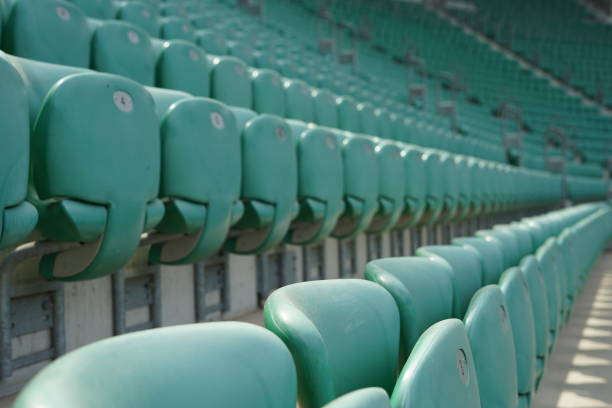 istock Green rows of chairs at stadium 1157779258