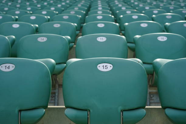 istock Green rows of chairs at stadium 1157779263