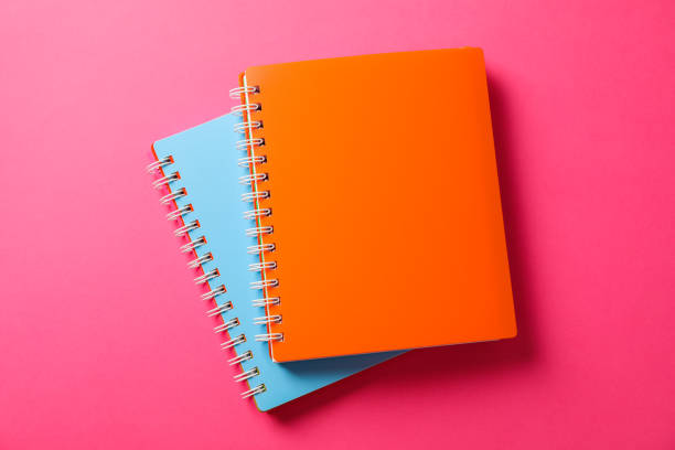 istock School copybooks on color background, space for text 1157784961