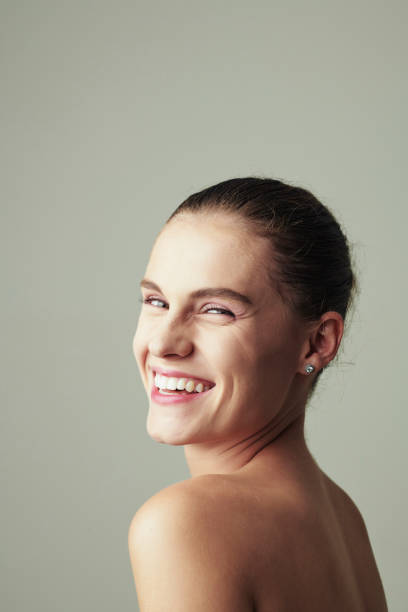 istock Laughing young woman 1157787357