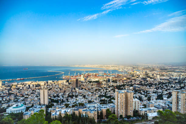 panoramic view of the harbor port of haifa, with downtown haifa, the harbor, the industrial zone in a sunny summer day. haifa, northern israel - sea commercial dock harbor bay imagens e fotografias de stock