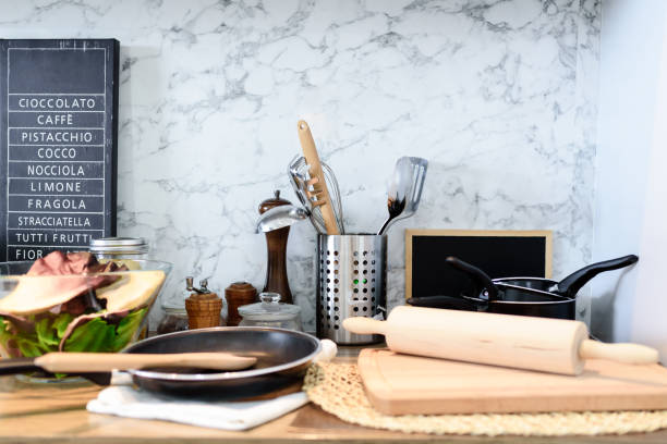 istock Interior of kitchen room with set of kitchenware on marble background. 1157787595