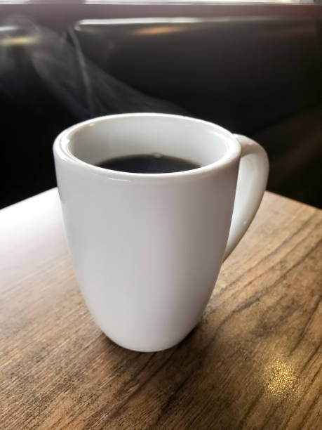 istock Cup of coffee in a diner table 1157790276
