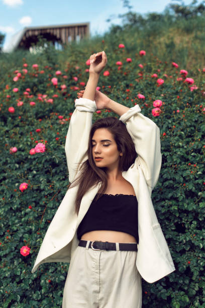 istock Young brunette in stylish modern clothes 1157791708