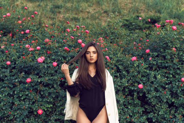 istock Young brunette in stylish modern clothes 1157791803
