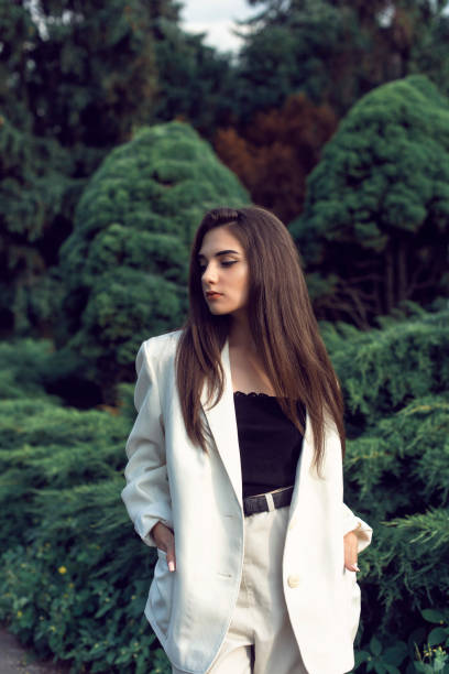 istock Young brunette in stylish modern clothes 1157791822