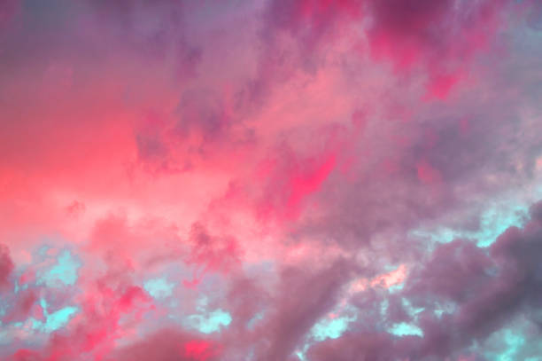 istock Colorful pastel clouds in the sky at sunset, dramatic clouds after a thunderstorm, the effect of toning photos in red and pink 1157793163
