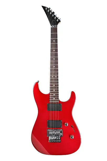 Photo of Red electric guitar on white background