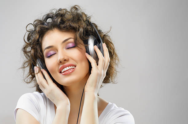 istock girl with headphones 115780018
