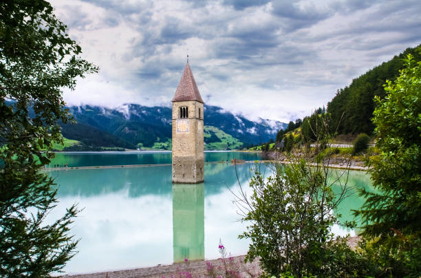 istock The bell tower in Lake Reschen. 1157801764