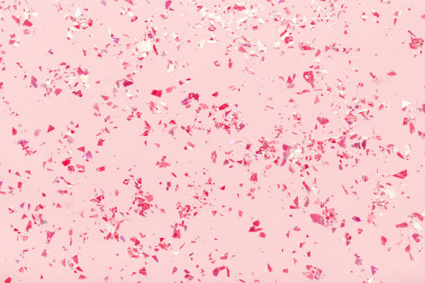 istock Red glitter mica sparkles on pink pastel trendy abstract background. 1157803444