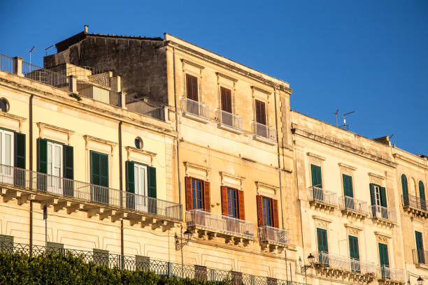 Buildings and park at Ortigia, the historical centre of Syracuse, Sicily, Italy