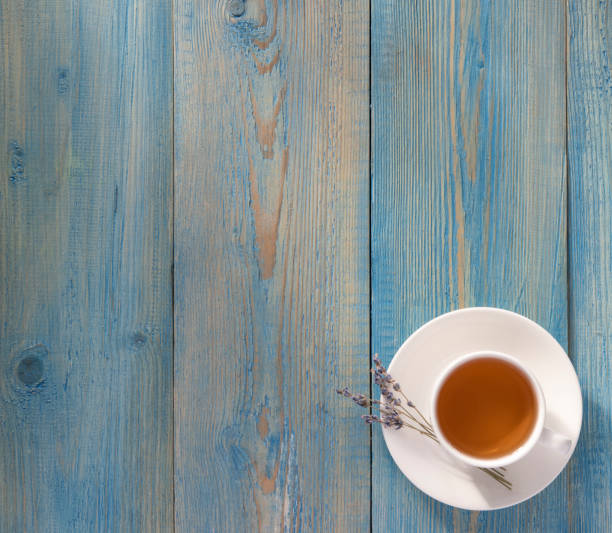 istock lavender cup of tea on the wood blue table breakfast rustic provence top view pure copy space 1157816679