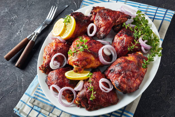 istock hot grilled chicken thighs 1157818180