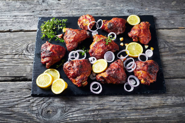 istock hot grilled chicken thighs 1157818341