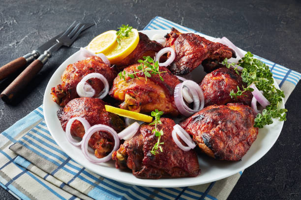 istock hot grilled chicken thighs 1157818342
