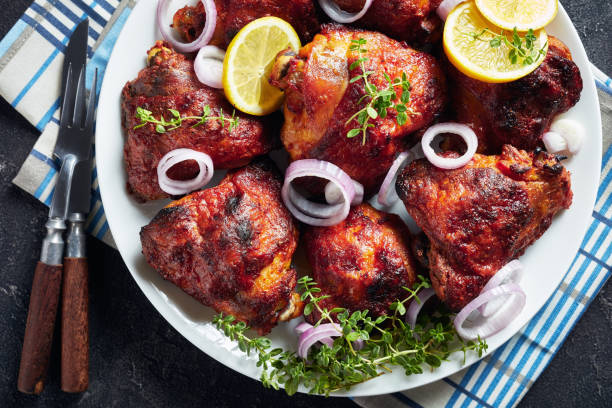 istock hot grilled chicken thighs 1157818369