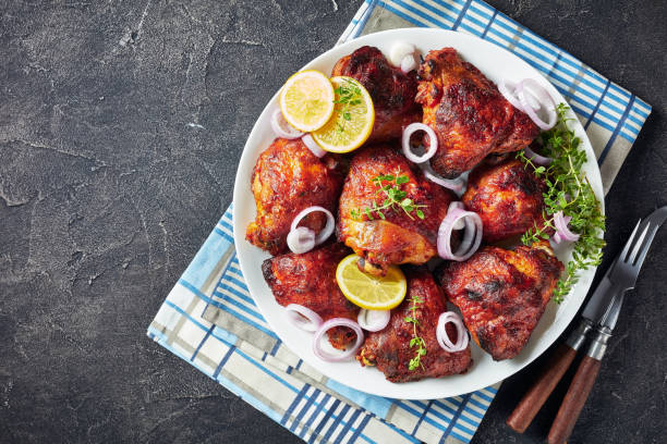 istock hot grilled chicken thighs 1157818391