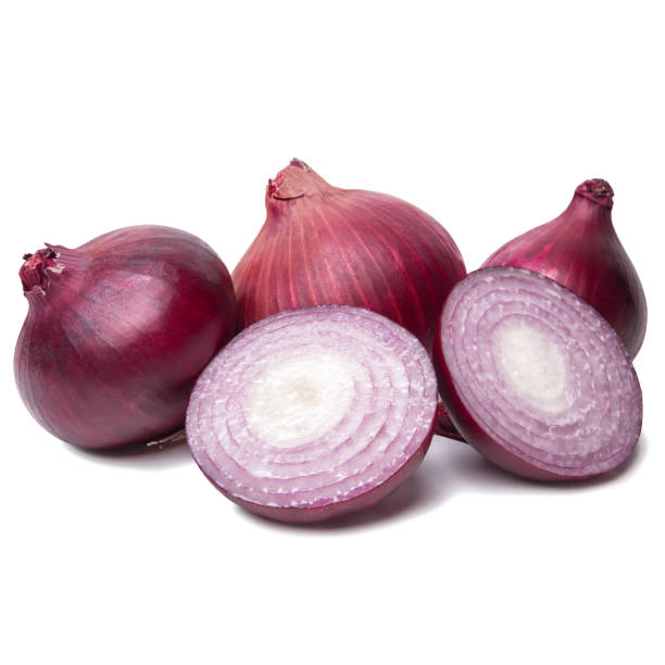 istock Red onion closeup isolated on white background 1157819881