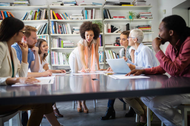 istock Successful group of business people at work in office 1157821801