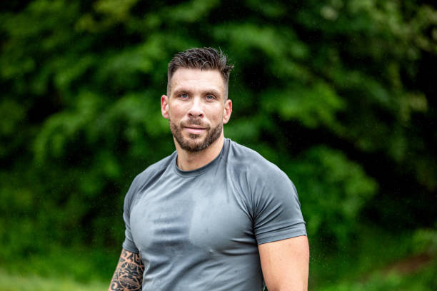 istock Sweaty Mid Adult Athlete Taking a Break 1157822502