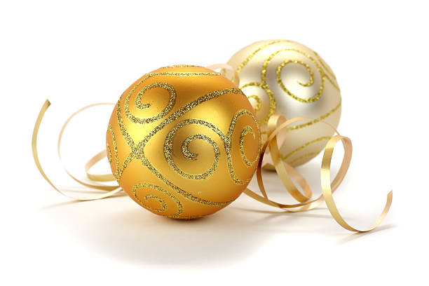 Gold and silver christmas decoration baubles on white background stock photo