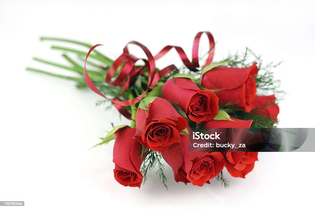 Medium red rose bouquet on white shallow dof. For more bouquets and posys isolated on white, Arrangement Stock Photo