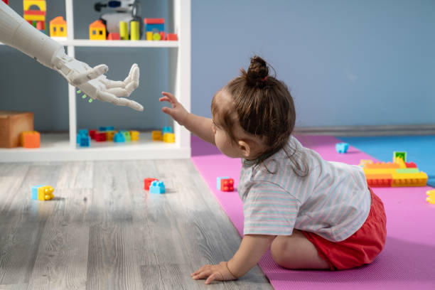 istock Baby Girl Playing With Robotics 1157824583