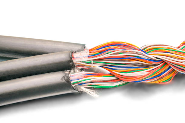 istock Interlacing telecommunications telephone and Internet lines. Three thick cables tangled in one big bundle of wires. Multi-colored wires Unshielded twisted pairis are on a white background. 1157824707