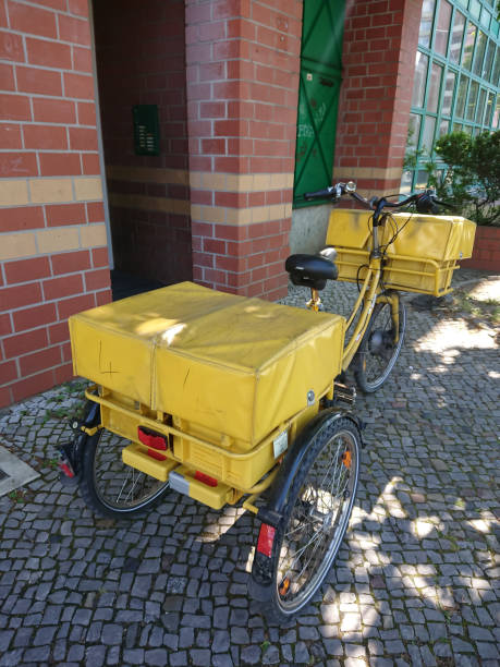 german deutsche post bike - deutsche post ag package germany occupation imagens e fotografias de stock