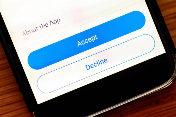 istock Accept and Decline buttons on smartphone app screen closeup 1157826345
