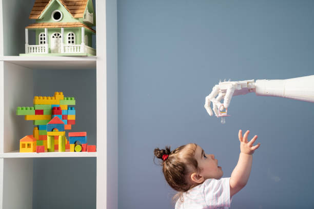 istock Humanoid Robotic Hand Giving Pacifier To Baby 1157826455