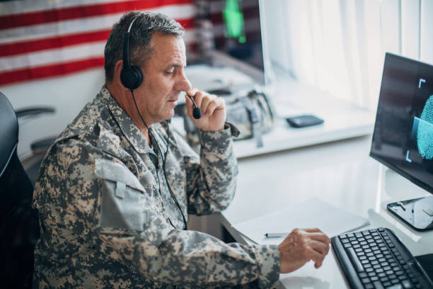 istock Senior man in US military uniform working at the office 1157827660