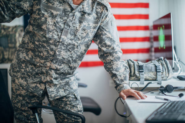 istock Soldier standing at the office 1157828058