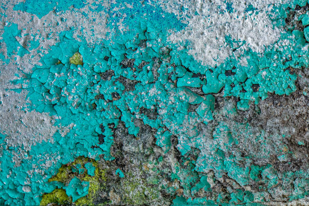 Old cracked rusty peeled colorful paint background texture close-up
