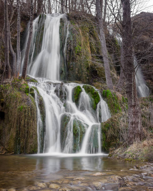 istock Beautiful Bigar waterfall on Old mountain with blurred motion water and colorful moss 1157831786
