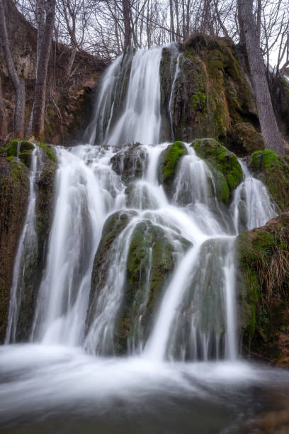 istock Beautiful Bigar waterfall on Old mountain with blurred motion water and colorful moss 1157831883
