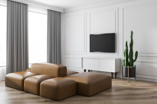 istock Modern living room design interior with sofa and TV screen. 1157836886