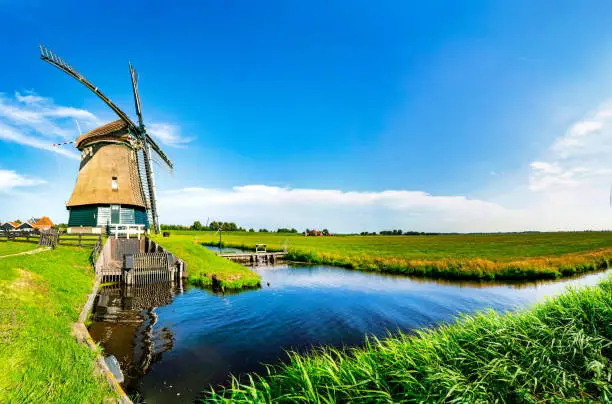 Beautiful windmill in a picturesque landscape near Volendam
