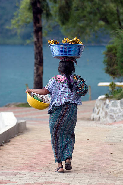 Mayan Woman with fruit, Lake Atitlan Guatemala stock photo