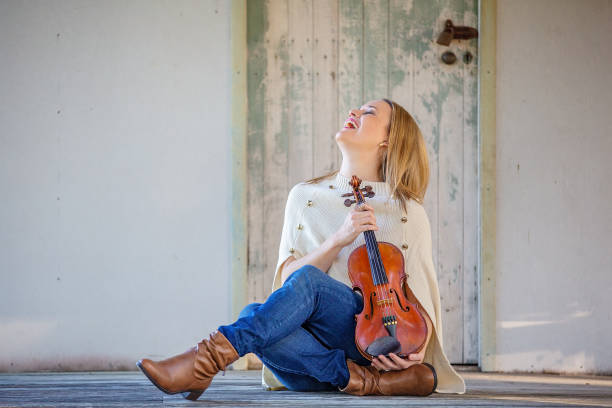 istock Beautiful Happy Musician With Antique Violin 1157845507