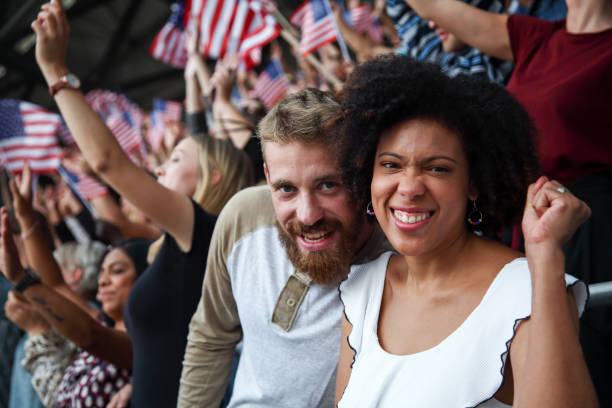 istock Couple taking a selfie at a footbal match 1157846400