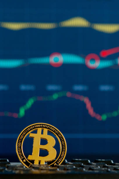 istock Bitcoin gold coin and defocused chart background. Virtual cryptocurrency concept. Bitcoins on ladder chart cryptocurrency concept. Bitcoin currency with blockchain concept 1157852273