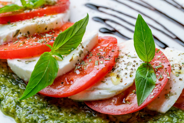 istock Caprese salad with mozzarella and tomato 1157856580