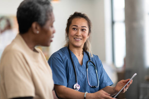 istock Doctor and patient having a conversation 1157858326