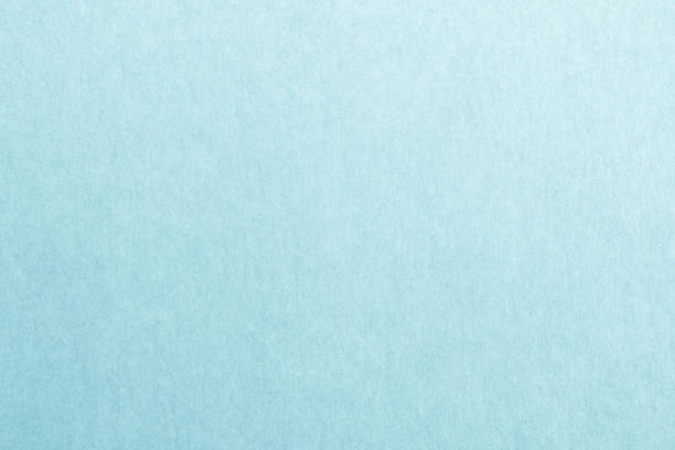 istock Recycled paper texture background in cyan blue color 1157858535