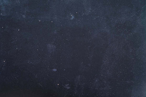 istock dust scratches dark blue background night sky 1157858825