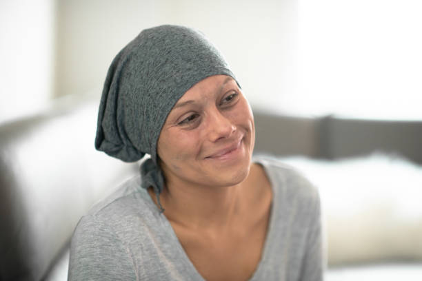 istock Woman wearing headscarf due to chemo smiling 1157859545