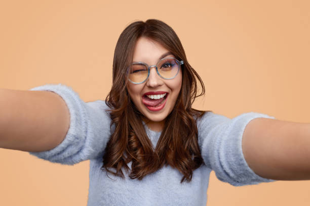 istock Funny woman taking selfie 1157860004