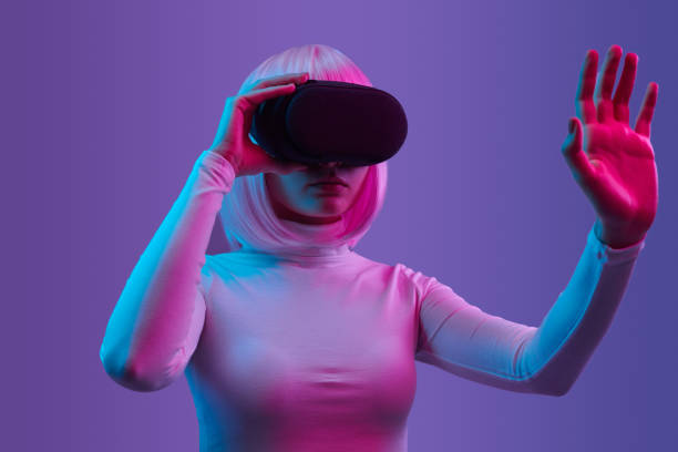 istock Futuristic female in VR glasses 1157860047